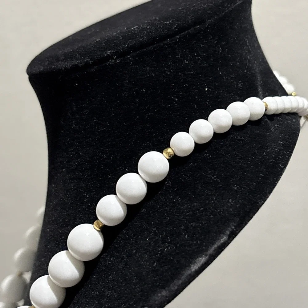 Long Vintage Monet White Graduated Bead Necklace Gold Tone Spacers 31